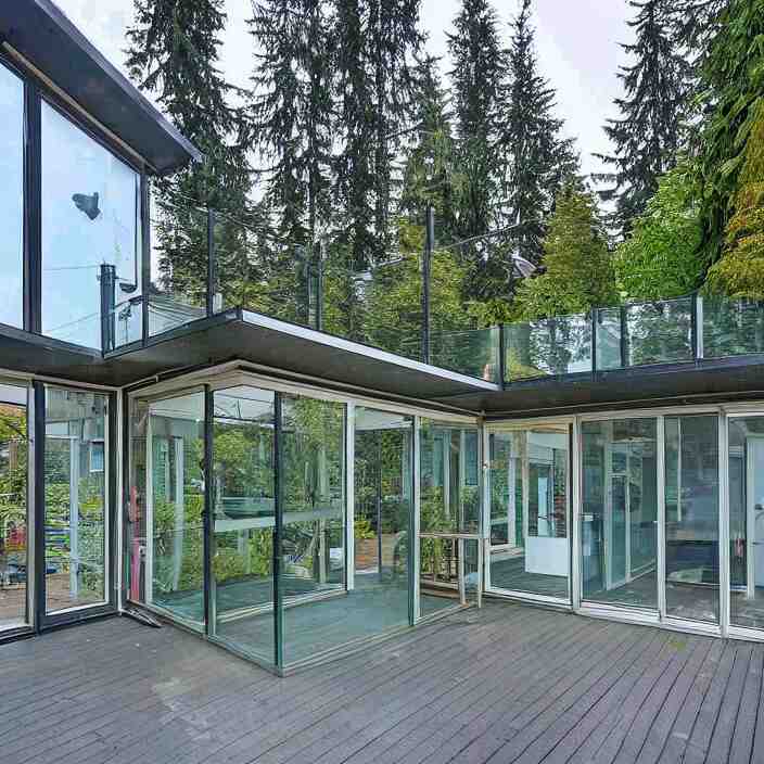 glass house on stilts at 2875 adanac.st vanvcouver,british columbia,canada