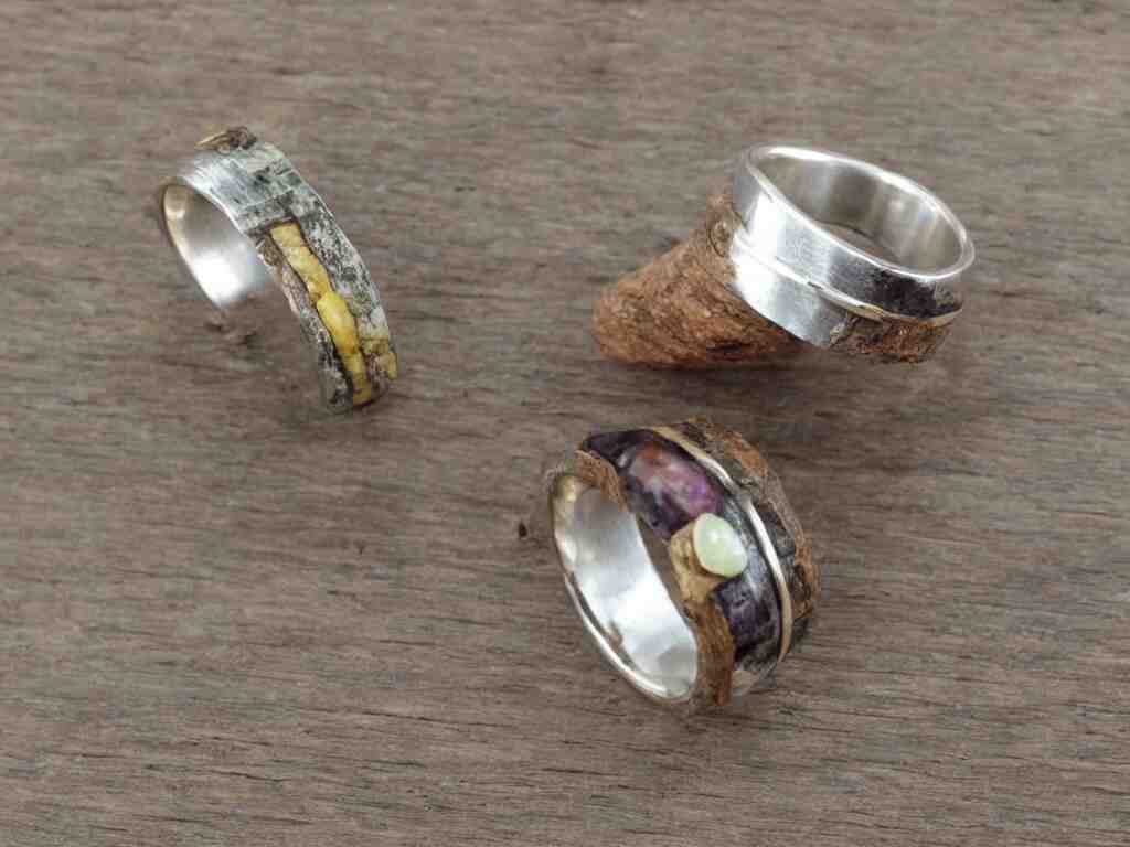 innovative rustic hand made rings hand crafted from silver and brass and natural gemstones